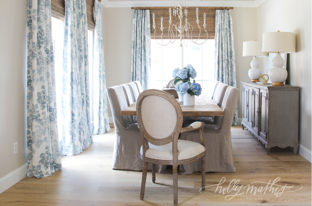 Beautiful dining room by Holly Mathis with bamboo shades, my favorite affordable window treatments!